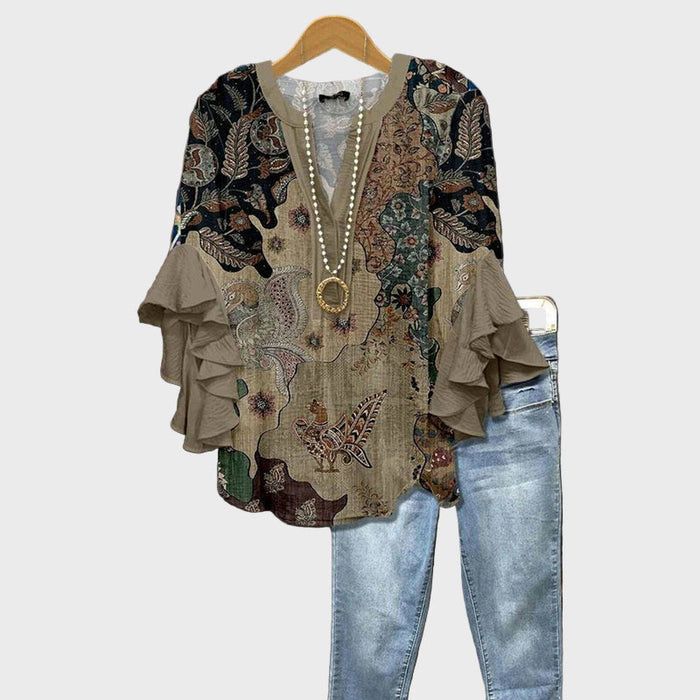 Beige bluse med hvide blomster