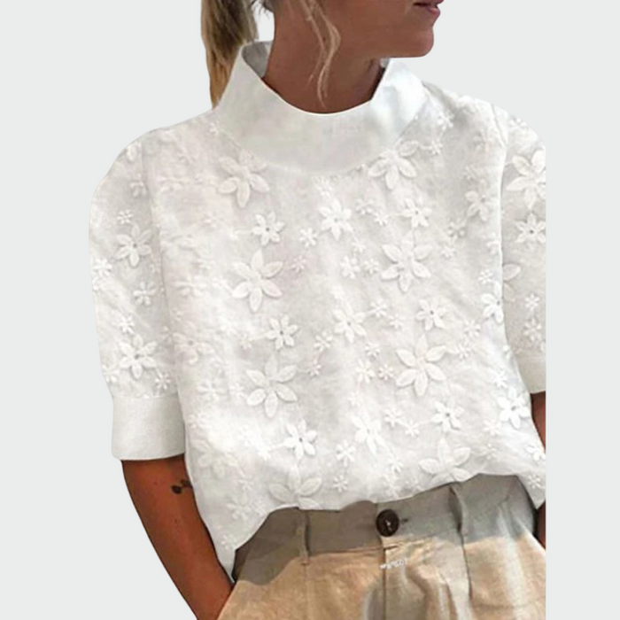 Hvid broderet bluse med høj krave