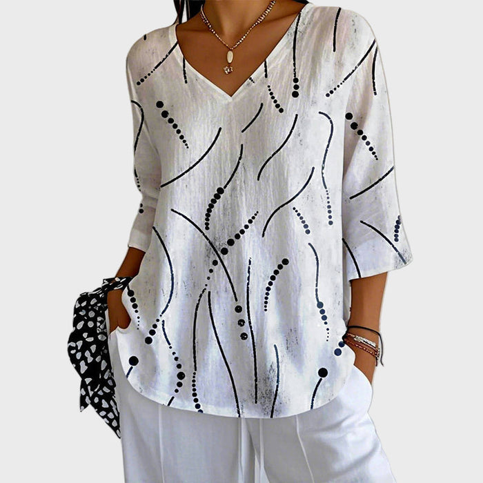 Hvid bluse med abstrakt print