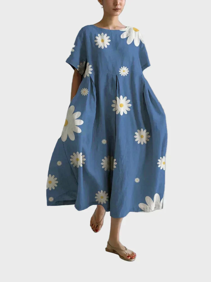 Blå kjole med margueritter